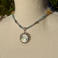 Necklace with a pendant on a mannequin bust