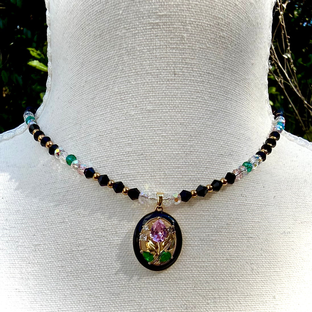 Necklace with a floral pendant on a mannequin bust