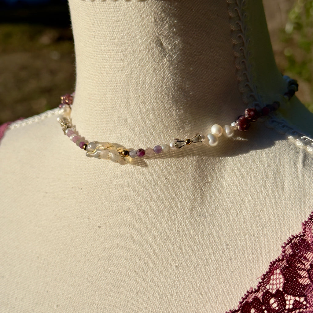 Necklace with beads on a mannequin bust