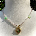 Necklace with a hexagonal locket pendant on a mannequin bust